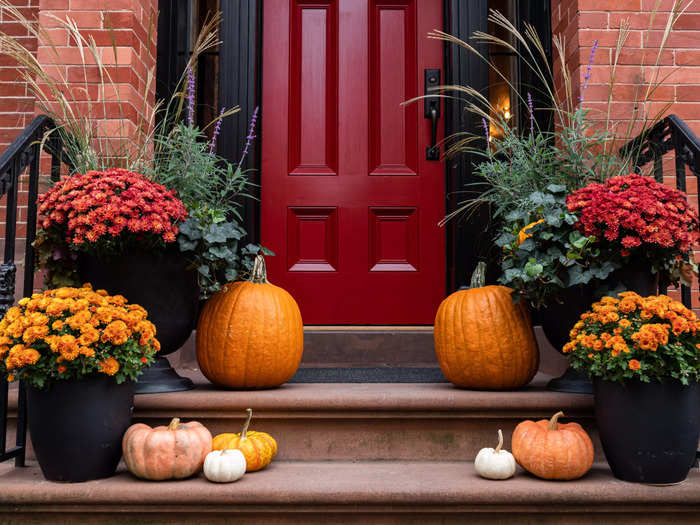 Using real pumpkins and gourds can also elevate your outdoor and indoor fall home decor.