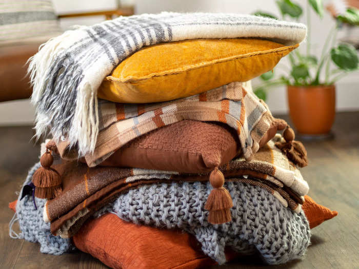 Textured pillows in organic materials are another tasteful addition to fall home decor.