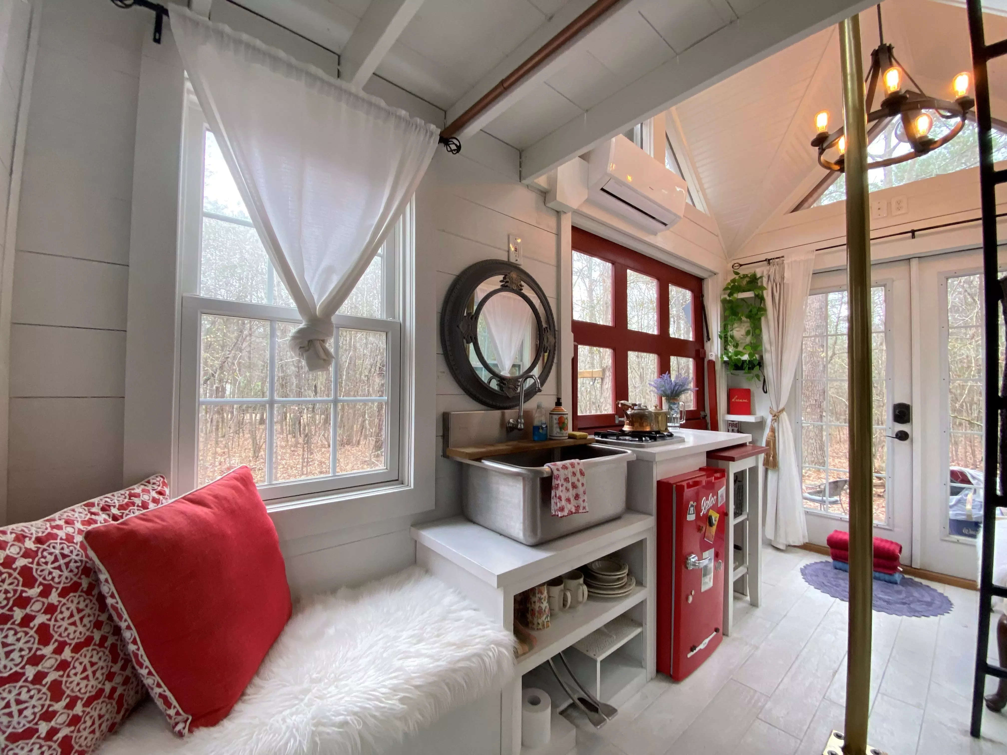 the inside of a renovated tiny firehouse