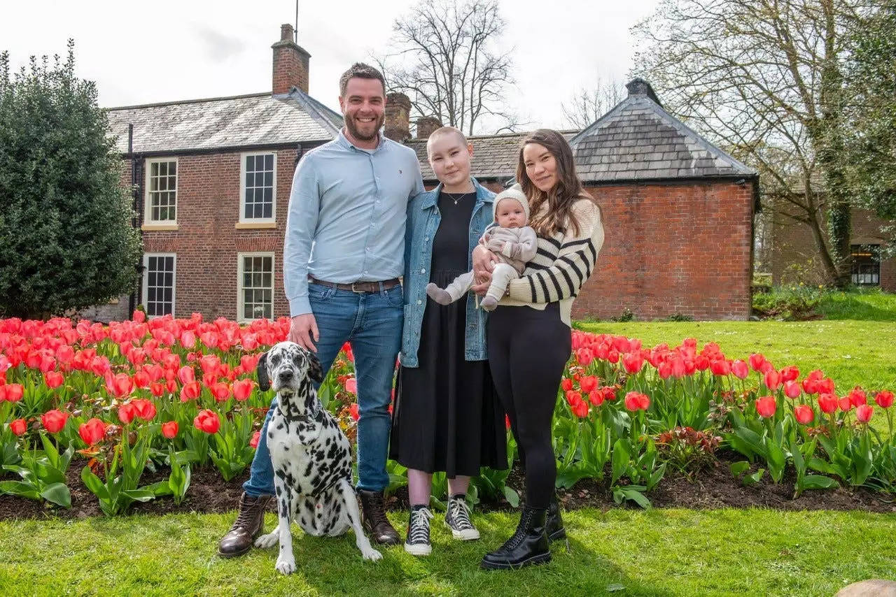 The Daniels family with their late dalmatian, Chops.