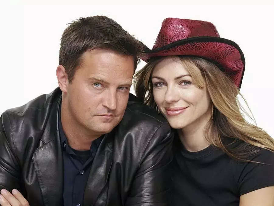 Matthew Perry and Elizabeth Hurley in a promotional image for "Serving Sara"