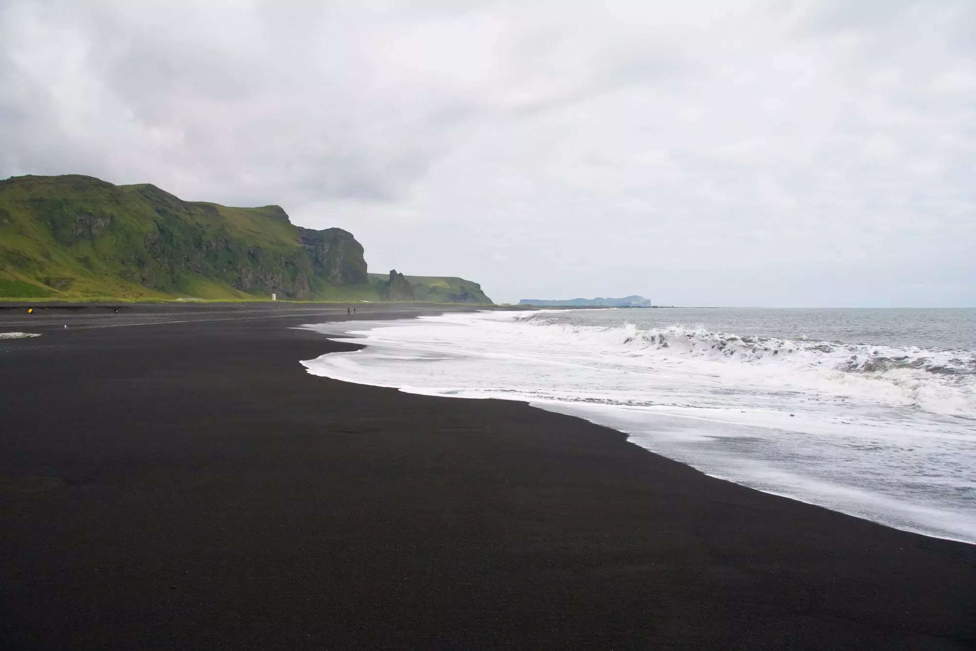 A view of the black-sand beach in Iceland.