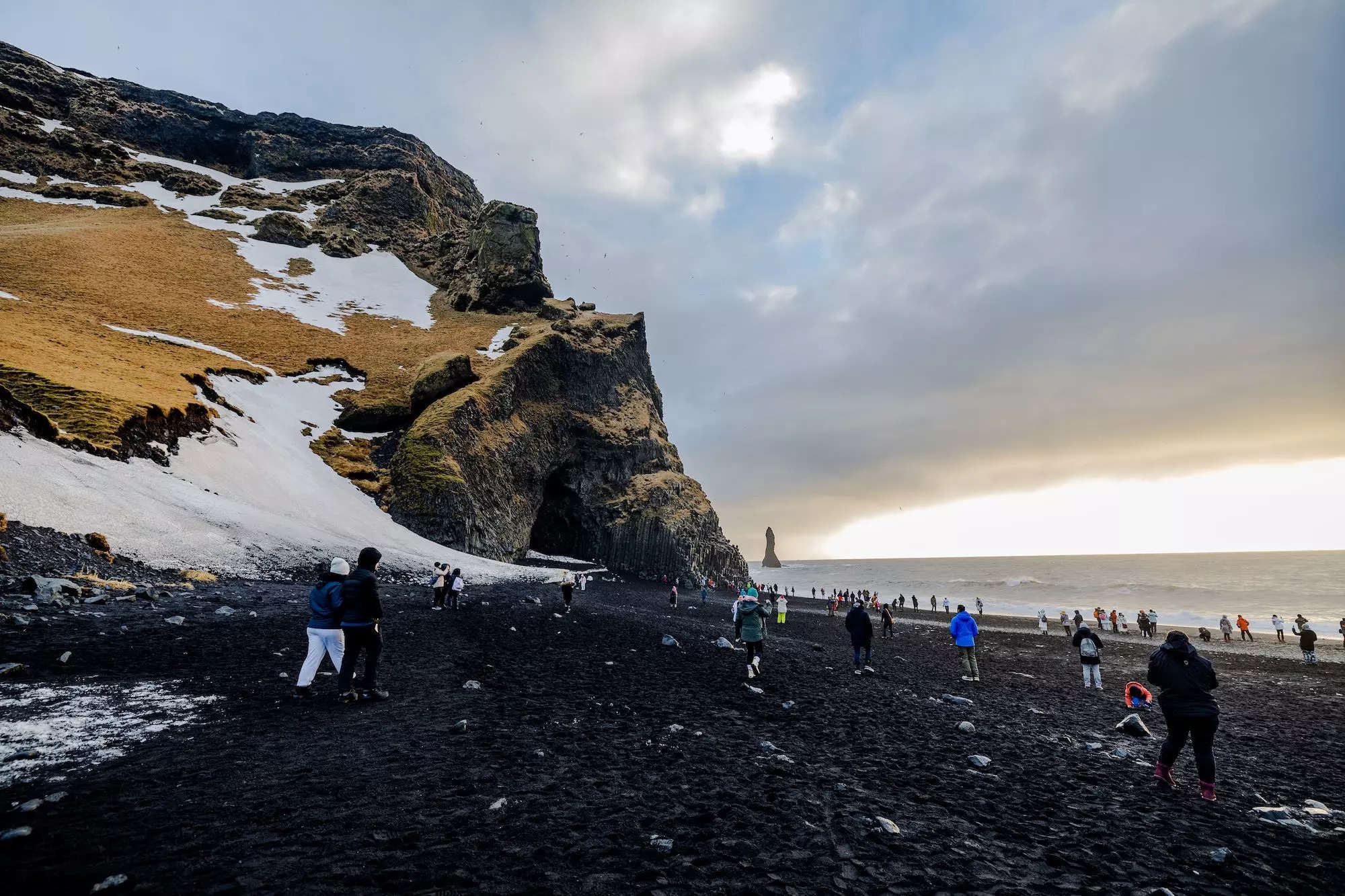 Tourists visit Reynisfjara in Iceland on January 24, 2023.