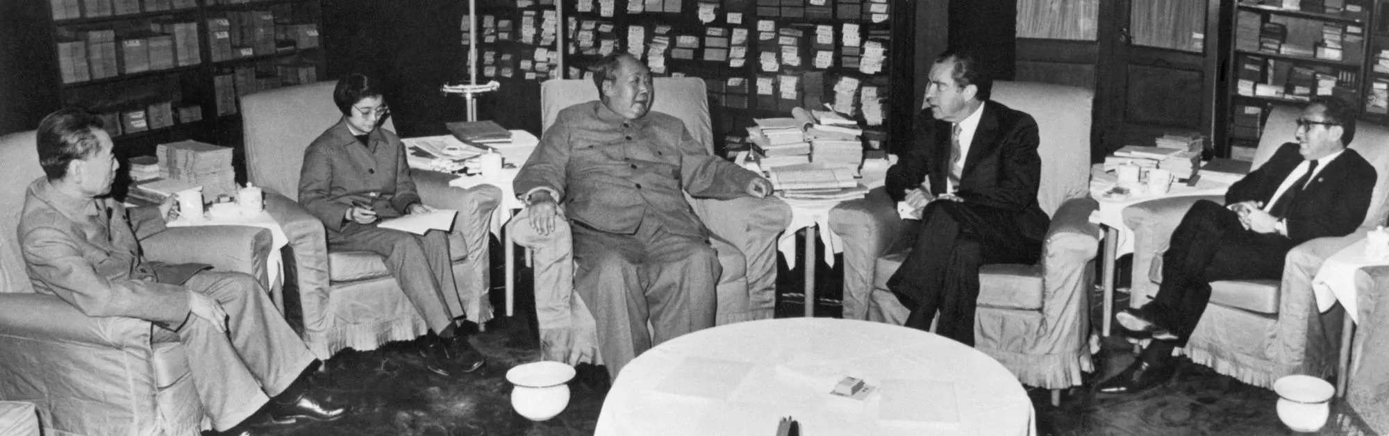 President Richard Nixon (2nd from the right), Chinese Communist Party Chairman Mao Zedong (center), Premier Chou En-lai (left), interpreter Tang Wen-sheng (centre-left), and Dr. Henry A. Kissinger (right), Nixon