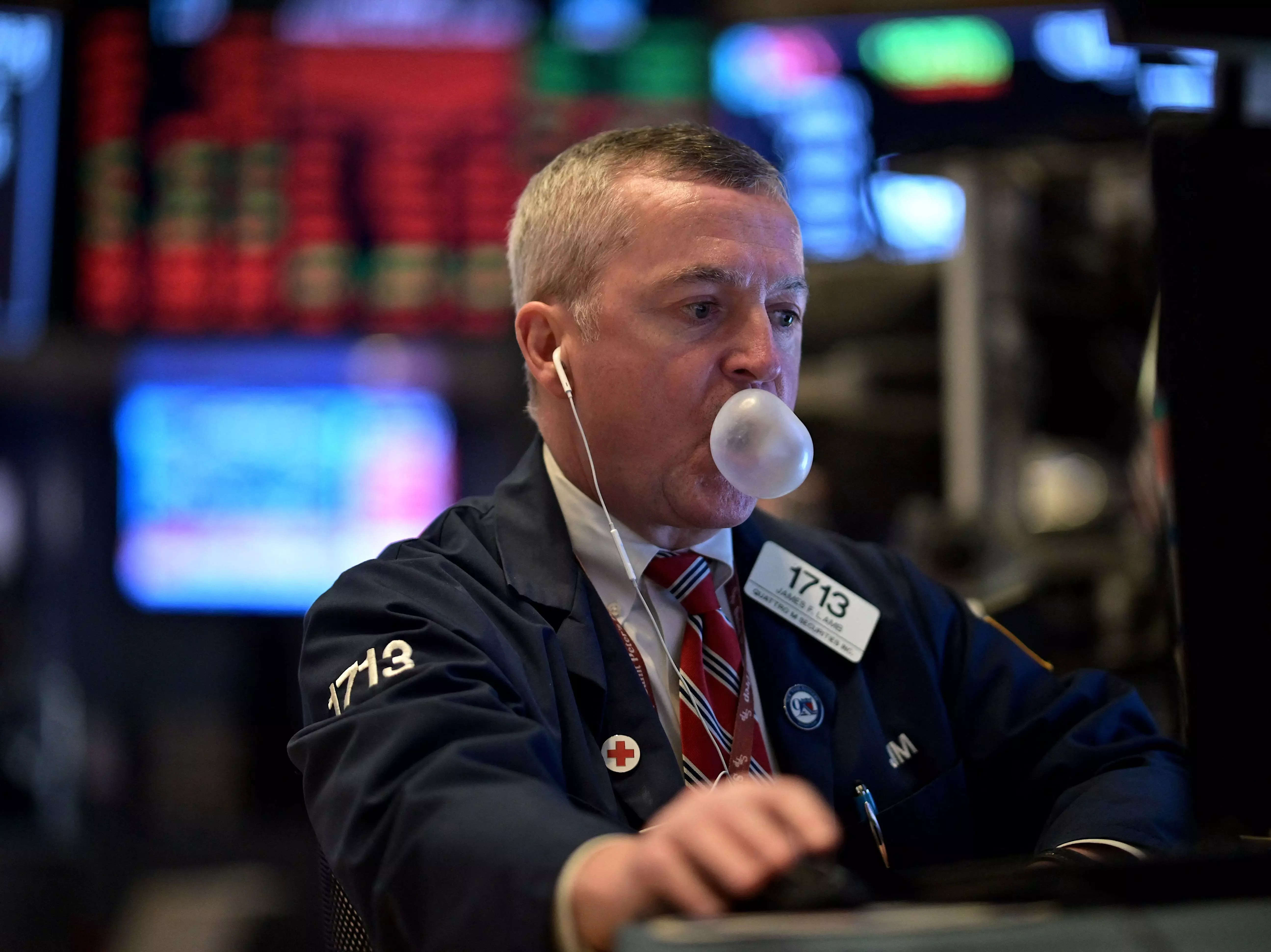 Image of a stock trader at the New York Stock Exchange.
