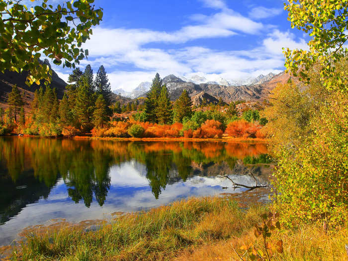 Fall scenery is reflected in Lake Sabrina in Bishop, California, in the Inyo National Forest.