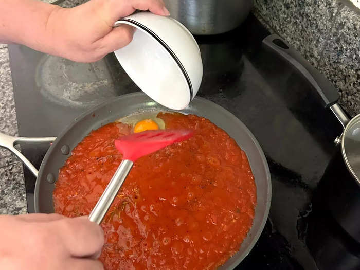 I slid the first egg into my pan, being careful not to break the yolk.