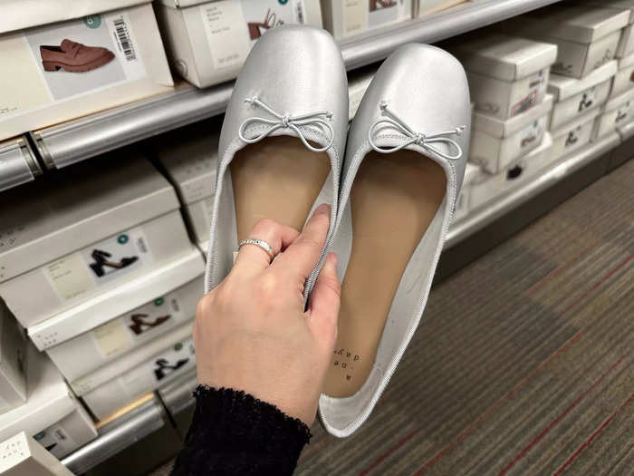 I visited my local store on Tuesday and quickly noticed lots of shoes that looked like expensive footwear. First, these silver ballet flats.