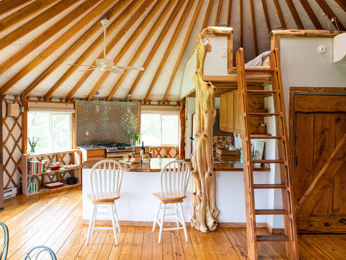 Built using locally sourced materials and salvaged wood, the yurt has an open-living concept that toes the line between luxury and rustic charm.