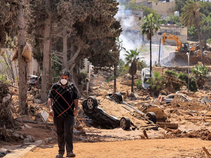 The flood effectively bisected the city of Derna, flipping cars, destroying buildings, and killing thousands in its wake.