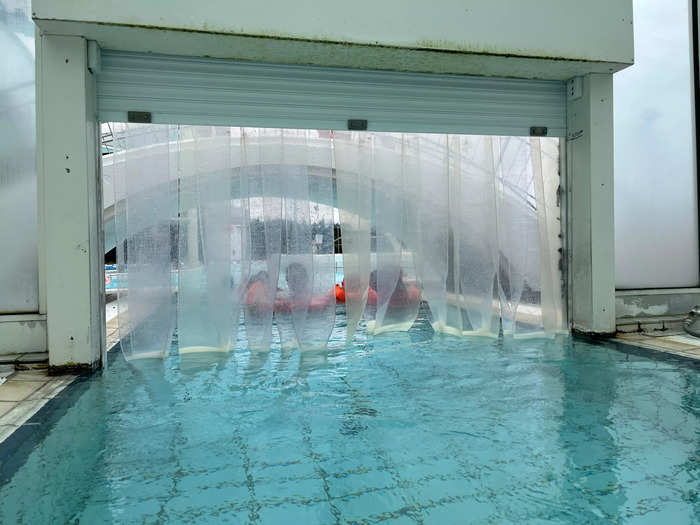 A passageway led into the outdoor section of the pool.