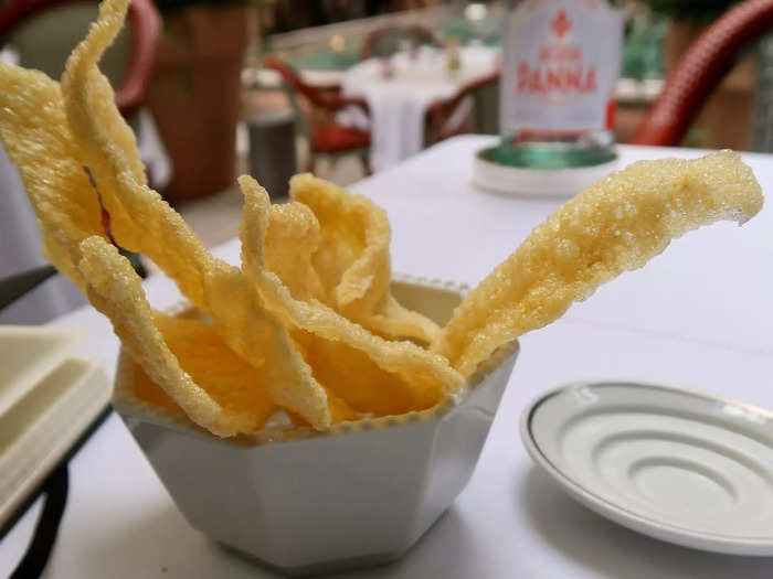 Shortly after sitting down, I was served a few porous polenta chips.