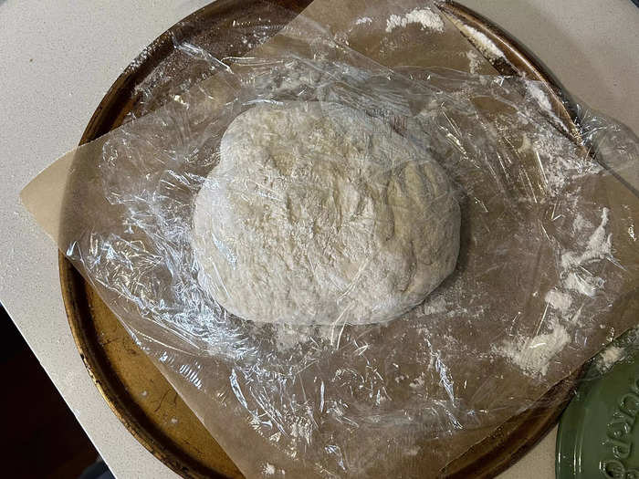 While the oven is preheating, place the dough onto a well-floured surface.