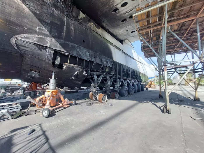 The twin tail fins, engines, several tires, and the wings have since been removed from the plane, leaving behind just the giant frame of the Myria.