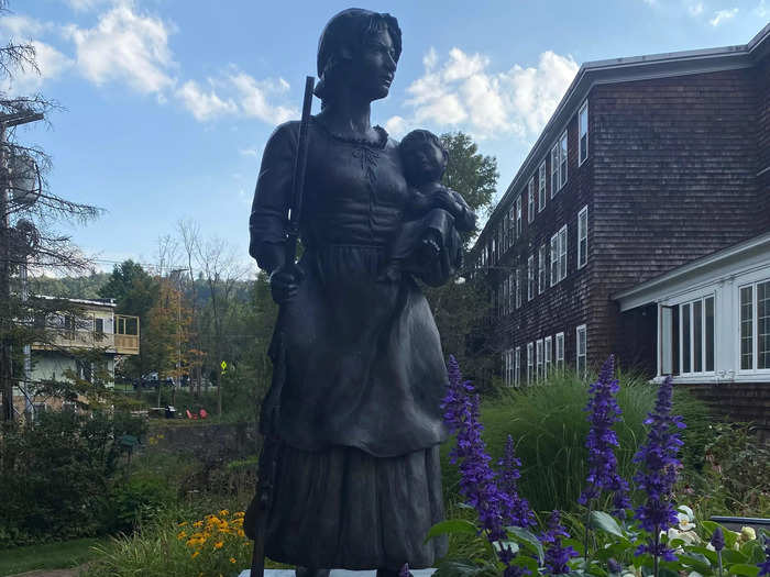 Molly Stark, whose statue is holding a baby in one hand and a rifle in another, is part of our town