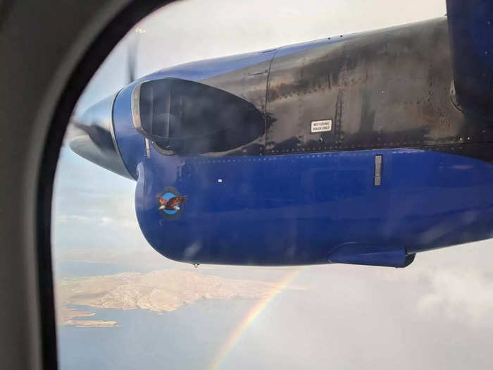 I captured this photo of a rainbow from our window.