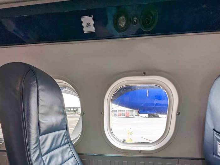 I was thankful that the seat across the aisle was empty — I used it to store my belongings.