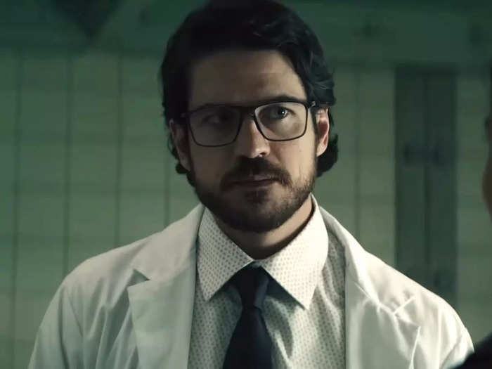 Marco Pigossi plays Dr. Edison Cardosa.