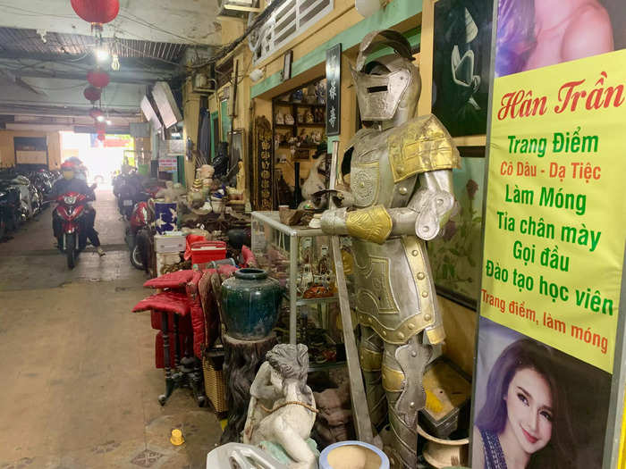 To reach the room, I passed a motorbike parking lot and some local stores, including a bizarre antique boutique.