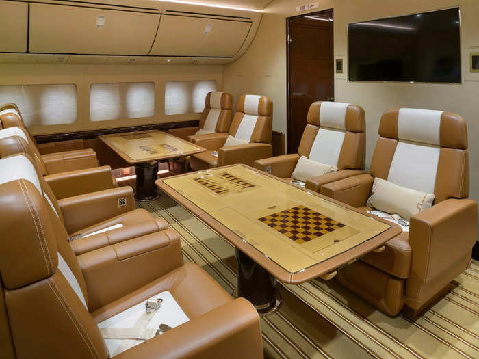 The aircraft even has a smaller seating section for additional passengers or staff complete with tables and large in-flight entertainment systems. According to Pinto, the owner has a large family that flies extensively.