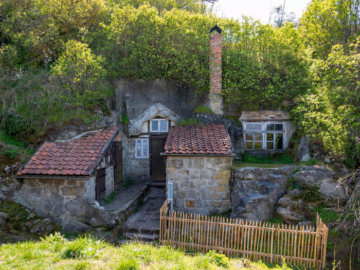 A village of hobbit-style cave homes was carved in Langenstein, Austria.