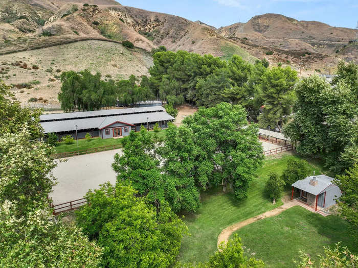 The property is four-and-a-half acres and sits near the edge of Angeles National Forest.