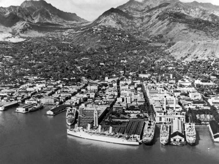 1945: Four years after the attack on nearby Pearl Harbor, and the same year World War II came to a close, an aerial view shows the port of Honolulu.