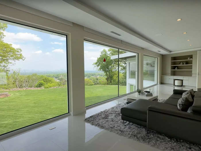 The bedroom features its own private lounge area and a desk built into the wall.