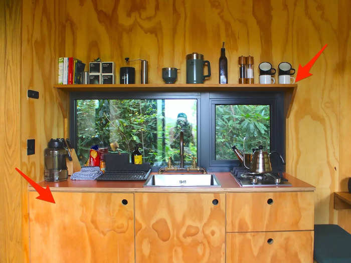 Over in the kitchen, cooking essentials were accessibly stored beneath the counter and on a small ledge above it. Both helped keep the cooking space from becoming overcrowded with miscellaneous items whenever I made a meal.