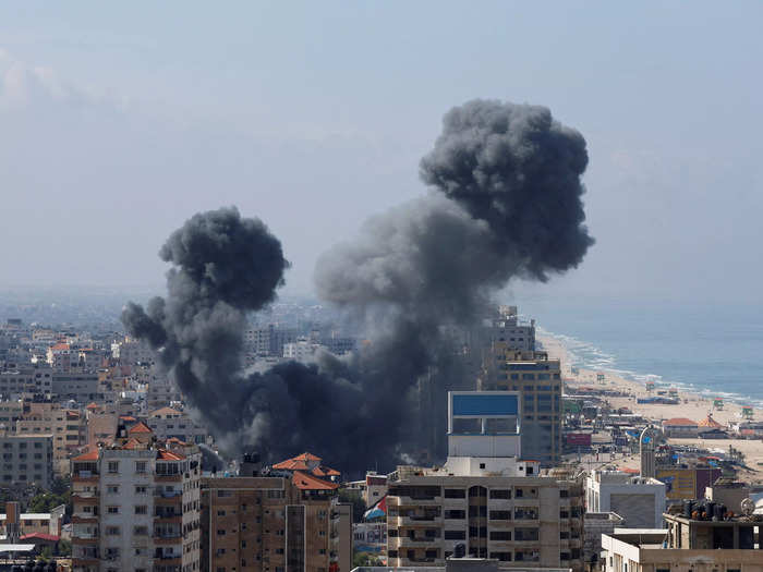 3. Smoke rises from buildings in Israeli after Hamas launched rockets.