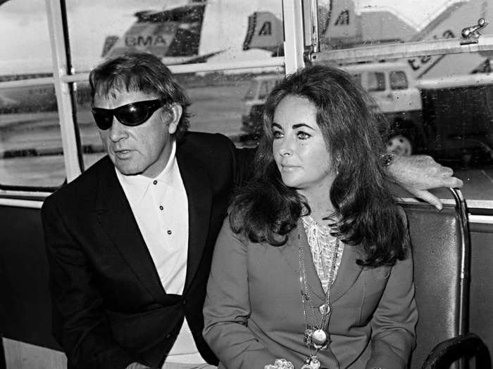 Elizabeth Taylor and Richard Burton, then on their first marriage to each other, were pictured at London Airport in 1970.