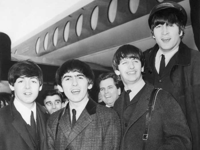 The Beatles arrived at London Airport from Paris in 1964, when Beatlemania was well underway.