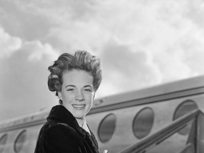 Then mostly known as a Broadway star, 23-year-old Julie Andrews was pictured boarding a flight at London Airport — since renamed Heathrow Airport — in 1959.