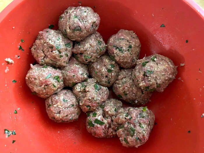 I mixed all the ingredients together, making 14 meatballs out of the mixture.