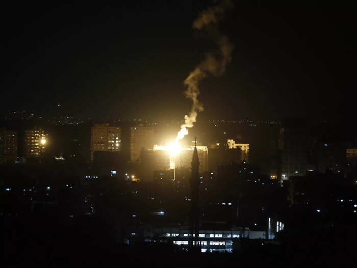 Airstrikes continued into the night amidst blackouts.