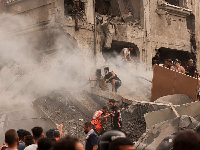 Palestinian rescuers across Gaza have been scouring the rubble for injured people.