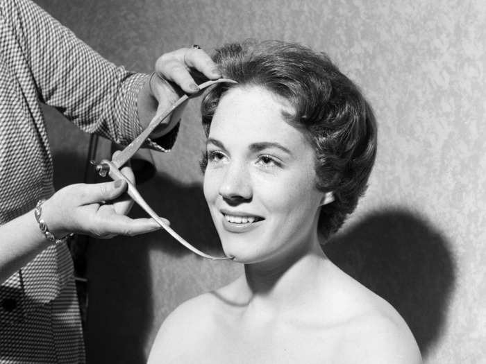 Julie Andrews, then best known for starring in "My Fair Lady" on Broadway, sat to get her head measured in 1958.