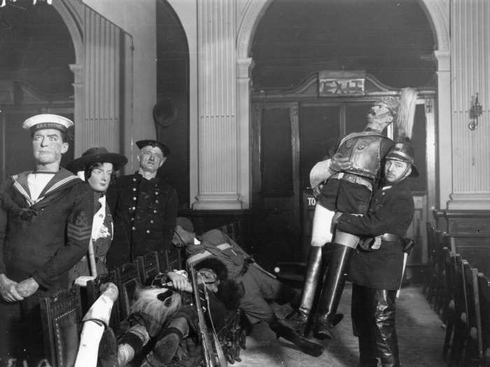 Police attempted to save as many waxworks as they could from the 1925 fire.