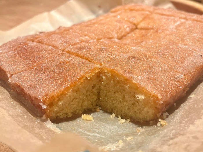 After letting it cool down to room temperature, I sliced the tray bake into thick cubes and was pleased to see how fluffy the inside looked.