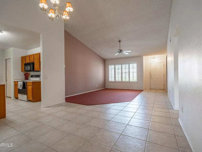 This home has a connected kitchen and living area.