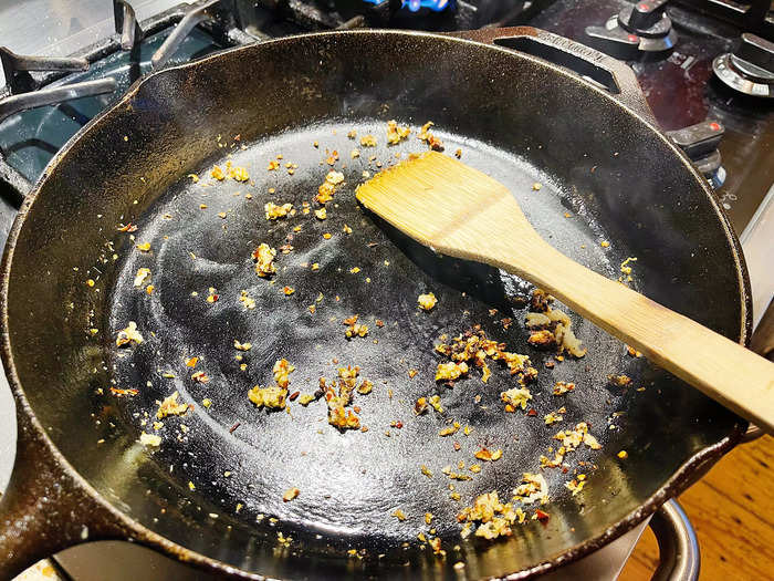 Next, I added three cloves of minced garlic, oregano, and red-pepper flakes to the pan.