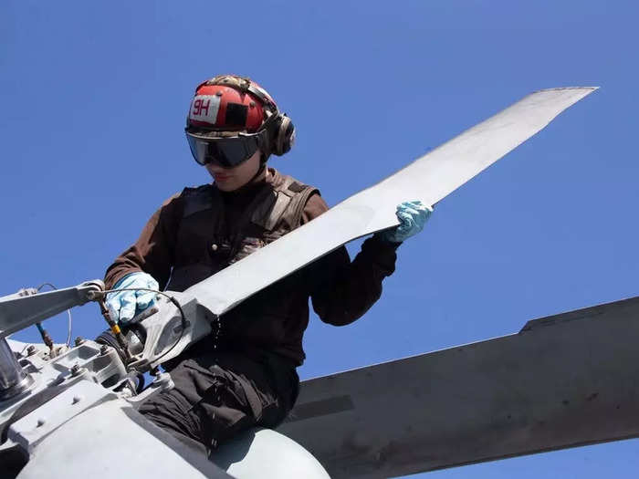 Or cleaning the rotor blades to clear debris and ensure smooth operation. 