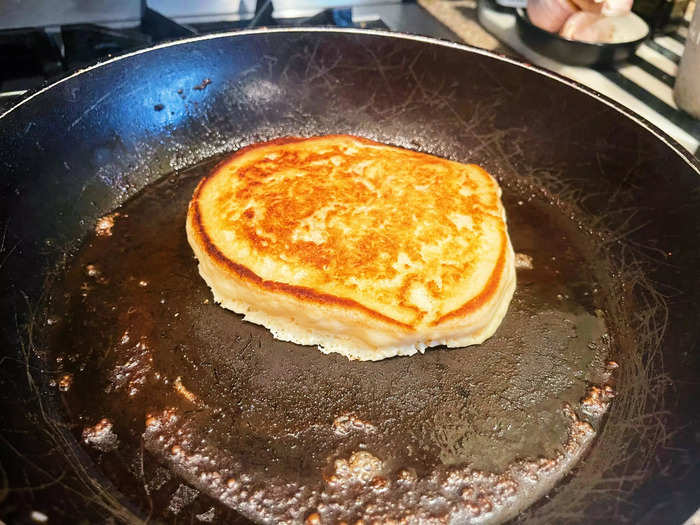 The pancake puffed up slightly and became a thicker consistency while cooking.