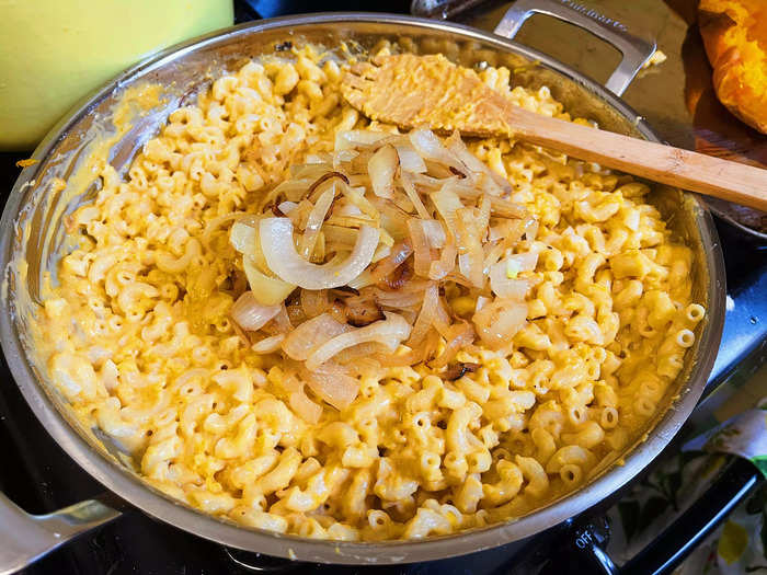 Once the sauce was done, I added the cooked macaroni and onions and stirred it together.