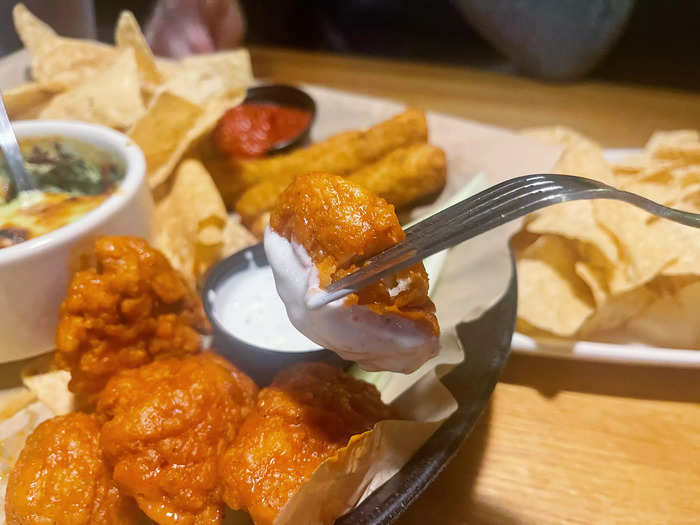 Our favorite of the five appetizers included in the platter was the boneless Buffalo wings.