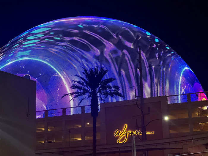 What makes the Sphere unique is its external wraparound LED screen — which the venue claims can be seen from space when fully illuminated. 