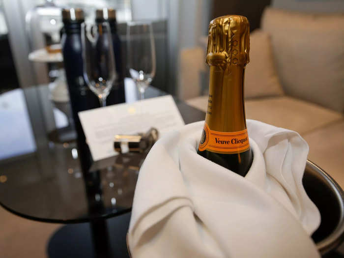 Similar to luxury cruise lines like the Ritz-Carlton Yacht Collection, travelers are greeted with a “complimentary” bottle of Veuve Clicquot in their cabin.