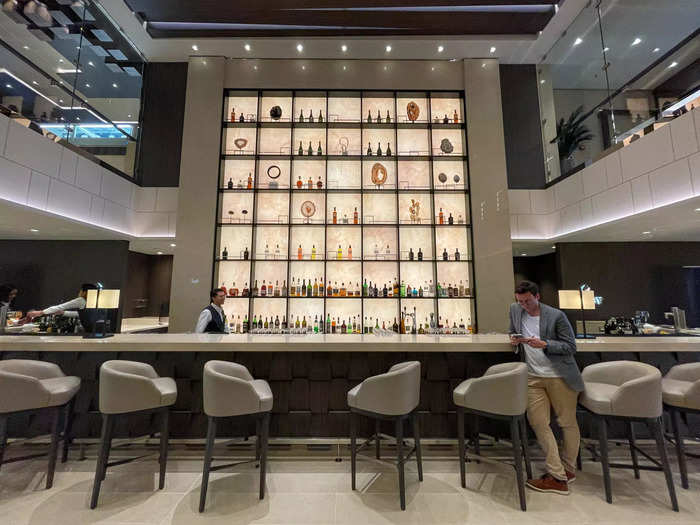 While most cruise ships are centered with a liminal space-like atrium, the Explora I has a “Lobby Bar” designed to look like a high-end hotel bar. 