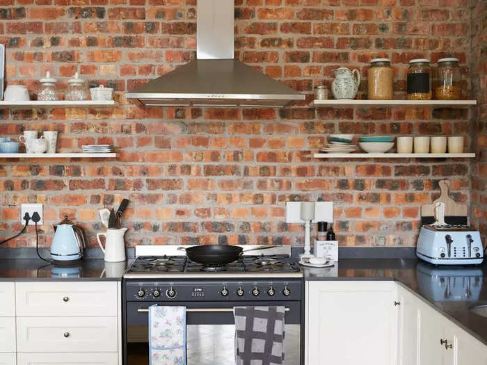 Open shelving can make a kitchen feel cluttered.