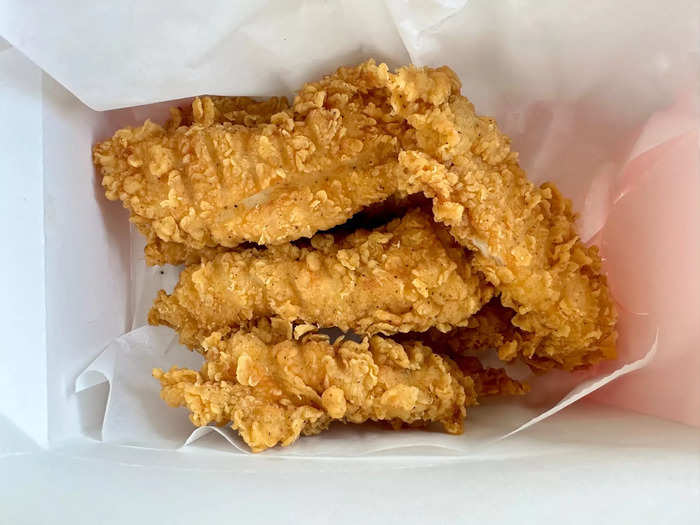 At KFC, the chicken tenders were thicker than at Popeyes, but the meat was bone dry.